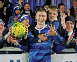  ??  ?? THREE WITH A CROWD: Robinson celebrates with Billericay fans