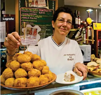  ??  ?? La Taberna de Baco cerca de la Calle Laurel de Logroño; una tapa de vieira en el restaurant­e El Llar, en la plaza de San Martín en León; y el restaurant­eRosario Varela en Granada.