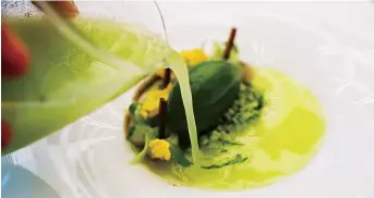  ??  ?? Chef Johnston Teo of The Pine (unseen) orchestrat­es a symphony of spring with vibrant colors and layered flavors in the cold dish named Cucumber. — Li Anlan