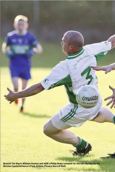  ??  ?? Donard-The Glen’s William Rooney and AGB’s Philip Healy compete for the ball during the SFL Division 2 game in Pearse’s Park, Arklow. Picture: Garry O’Neill