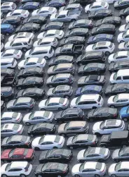 ??  ?? Unused rental cars fill the Dodger Stadium parking lot, Los Angeles, California, April 7, 2020.