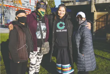  ?? FRaNCIS GEORGIAN ?? Jamie Smallboy, second from left, with founding members of the Women's Memorial March, from left, Veronica, Carol Martin and Skundaal, are sewing red ribbon skirts for families of missing and murdered Indigenous women. The skirts will be given out at the annual march Feb. 14.