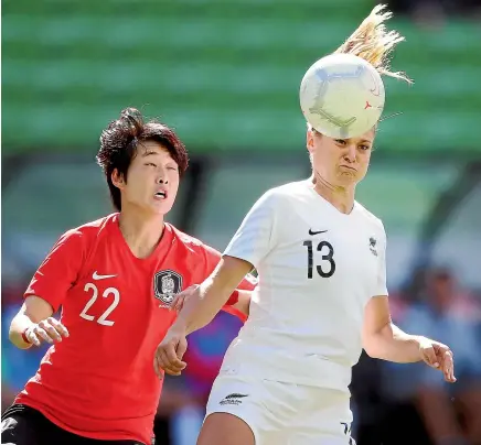  ?? GETTY IMAGES ?? Rosie White, right, in action against South Korea earlier this month, has headed back to New Zealand as she prepares for the World Cup.