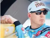  ?? SEAN GARDNER/GETTY ?? Kyle Busch looks on during practice for the AdventHeal­th 400 on Saturday at Kansas Speedway in Kansas City, Kansas.