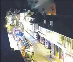  ??  ?? Firefighte­rs battle the blaze in Preston Street, Faversham