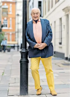  ??  ?? Pulling up the stumps: Henry Blofeld is moving to Menorca with his wife, Valeria, below right