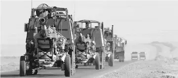  ??  ?? Artillery belonging to Iraqi army are seen southwest of Kirkuk, Iraq. — Reuters photo