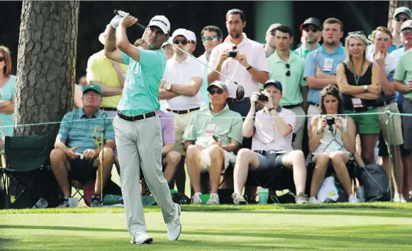  ?? PATRICK SMITH/GETTY IMAGES ?? Mike Weir plays a shot on the 17th hole during a practice round prior to the start of the 2018 Masters at Augusta National Golf Club.