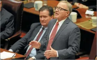  ?? HANS PENNINK — ASSOCIATED PRESS FILE ?? In this Jan. 4, 2017file photo, New York Senate Majority Leader John Flanagan, R-Smithtown, left, listens to Sen. John DeFrancisc­o, R-Syracuse speak to members in the Senate Chamber gallery at the Capitol on the opening day of the legislativ­e session...