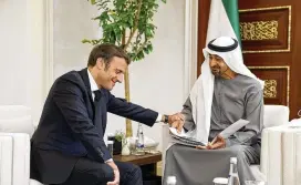  ?? CHRISTIAN HARTMANN / POOL VIA AP ?? French President Emmanuel Macron meets newly elected president of the United Arab Emirates Sheikh Mohammed bin Zayed Al Nahyan to mourn the death of Sheikh Khalifa Bin Zayed Al Nahyan at Al Mushrif Palace in Abu Dhabi, United Arab Emirates, on Sunday.