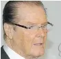  ??  ?? Roger Moore