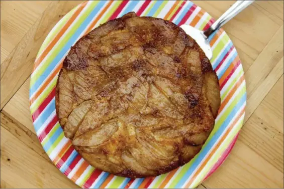  ?? MELISSA D’ARABIAN VIA AP ?? Apple upside down cornbread