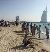  ?? Antonie Robertson / The National; Satish Kumar for The National ?? Eid Al Adha prayers, above and far left, at Al Farooq Omar bin Al Kahttab Mosque in Al Safa, Dubai; people at the open beach; and fireworks, right, at Festival City in Dubai