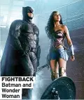  ??  ?? FIGHTBACK Batman and Wonder Woman