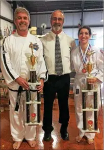  ?? SUBMITTED PHOTO ?? On Saturday, Nov. 4, the TUL JON-SA (Pattern Champion) major competitio­n was held at Mark Cashatt’s Taekwon-Do School in Souderton. Two local residents came out as overall champions. Pictured from left: 5th Degree Richard Hollenbach from Hatfield, who...
