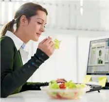  ?? 123RF ?? Sitting down at your desk while eating lunch is not to be recommende­d.