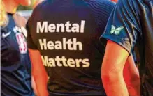  ?? Yalonda M. James/associated Press ?? Stanford University women's soccer team players wear warmup jerseys with “Mental Health Matters” on their backs. The pandemic took a harsh toll on U.S. teen girls' mental health.