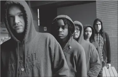  ?? VINCENZO D’ALTO THE GAZETTE ?? From left, Mcgill law students Alex Spraggs, Ngozi Okidegbe, Jason Chung, Anne-karine Dabo and Mark Phillips don hoodies to show solidarity with others protesting against the shooting death of hoodie-clad Florida teen Trayvon Martin.