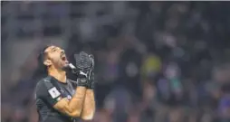  ?? AFP ?? Italy’s goalkeeper Gianluigi Buffon reacts during the FIFA World Cup 2018 qualificat­ion football match between Italy and Sweden in Milan on Monday. Sweden held Italy to a goalless draw, leaving the fourtime champion out of the tournament for the...