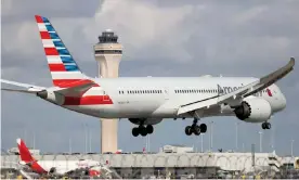  ?? ?? An American Airlines Boeing 787-9 Dreamliner lands at the Miami internatio­nal airport Photograph: Joe Raedle/Getty Images