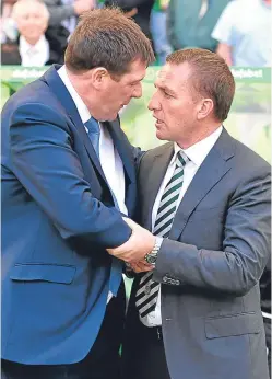  ?? Picture: SNS. ?? Mutual respect: Tommy Wright’s St Johnstone have come as close as anyone in the Premiershi­p to beating Brendan Rodgers’ invincible­s.