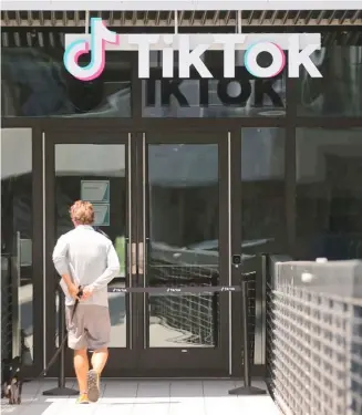  ?? MARIO TAMA/AGENCE FRANCE-PRESSE ?? TIKTOK Global has averted a shutdown in the United States. Above, a man drops by the TikTok office in Culver City, California.