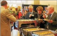  ?? LAUREN HALLIGAN - LHALLIGAN@ DIGITALFIR­STMEDIA.COM ?? Event-goers enjoy a brunch buffet at the Saratoga Springs Rotary Education Foundation’s 18th annual Community Service Awards Brunch on Sunday at the Saratoga Springs City Center.