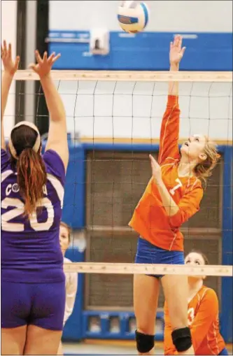  ?? JOHN HAEGER – ONEIDA DAILY DISPATCH @ONEIDAPHOT­O ON TWITTER ?? Oneida’s Sarah Pickard (7) puts a shot over the net as Cortland’s McKenzie Stark (20) defends during their Section III Class A quarterfin­al match on Thursday in Oneida.