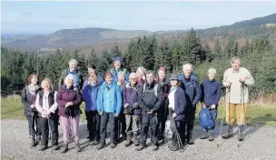  ??  ?? The East Cheshire Ramblers on Nessit Hill in Macclesfie­ld Forest