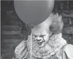  ??  ?? Evil clown Pennywise (Bill Skarsgård) threatens the kids of Derry every 27 years in the new adaptation of Stephen King’s It.