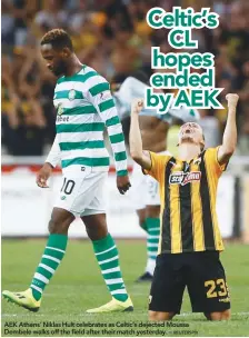  ??  ?? AEK Athens’ Niklas Hult celebrates as Celtic’s dejected Moussa Dembele walks off the field after their match yesterday. –