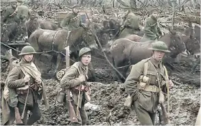  ??  ?? We’ve been transporte­d back to 1914, and the Great War is happening in front of us in director Peter Jackson’s They Shall Not Grow Old.