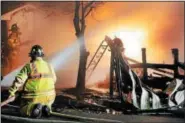  ?? TOM KELLY III — DIGITAL FIRST MEDIA ?? A multi-alarm fire heavily damaged or destroyed three mobile homes in Shaner’s Trailer Park in the 3000 block of East High Sreet in Lower Pottsgrove early Tuesday morning, according to Fire Marshall Lew Babel.