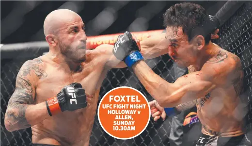  ?? ?? UFC FIGHT NIGHT HOLLOWAY v ALLEN, SUNDAY 10.30AM
Australian Alexander Volkanovsk­i (left) punches Max Holloway during their featherwei­ght title bout at UFC 276 in Las Vegas last July. Picture: Getty Images