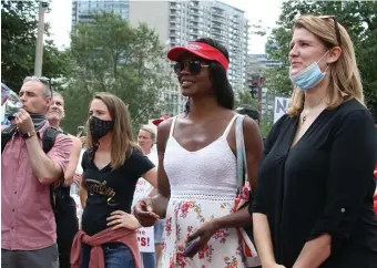  ?? NAncy LAnE / hErALd sTAff ?? STILL WAITING: Rayla Campbell, Republican challenger to Ayanna Pressley’s House seat, at center in Trump visor, is expecting to find out later this week if she has enough write-in votes to appear on the November ballot.