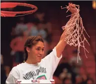  ?? Jonathan Daniel / Getty Images ?? MVP Rebecca Lobo cuts down the net in celebratio­n of UConn winning the national championsh­ip in 1995. That championsh­ip season kick-started more interest in women’s basketball from traditiona­l media.