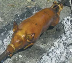  ?? WIKIMEDIA ?? Lechon is commonly served during fiestas in several towns and barangays in Aklan every May.