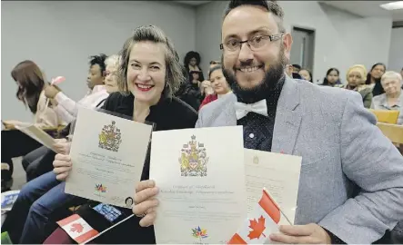  ?? LARRY WONG ?? Journal reporters Emma Graney, left, and Juris Graney officially became Canadian citizens Nov. 14 during a citizenshi­p court held at Canada Place.