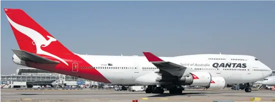  ??  ?? A Qantas Boeing 747-438/ER.