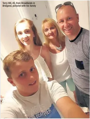  ??  ?? Terry Hill, 45, from Broadlands in Bridgend, pictured with his family