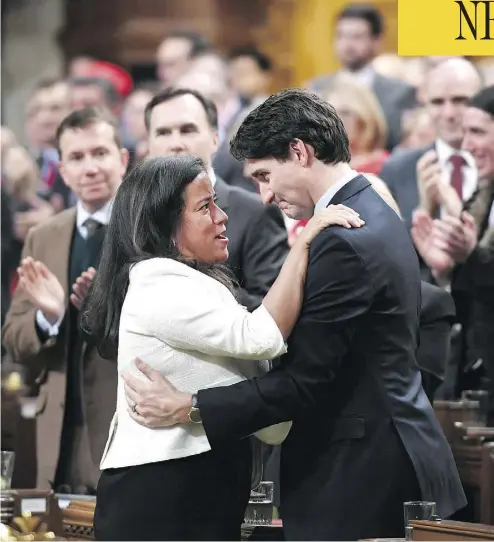  ?? JUSTIN TANG / THE CANADIAN PRESS ?? Prime Minister Justin Trudeau is embraced by Justice Minister Jody Wilson-Raybould after delivering a speech Wednesday on the recognitio­n and implementa­tion of Indigenous rights.