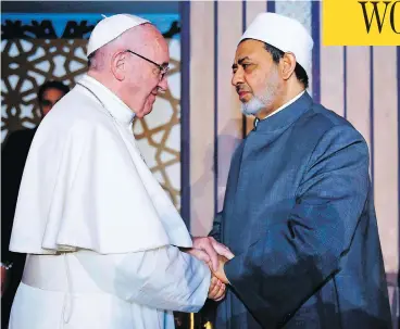  ?? AFP / AL- AZHAR MEDIA CENTRE ?? Pope Francis shakes hands with Sheikh Ahmed al-Tayeb, Grand Imam of Al-Azhar university, during a visit Friday in Cairo, where he rejected “every form of violence, vengeance and hatred carried out in the name of religion.”