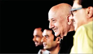  ??  ?? In this file photo taken on Dec 27, 2018 Indian Bollywood actor Anupam Kher (Centre) attends the trailer launch of his upcoming biographic­al political drama Hindi film ‘The Accidental Prime Minister’ in Mumbai. — AFP photo