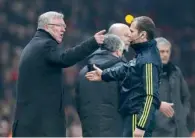  ?? AP ?? Ferguson argues with a linesman. —