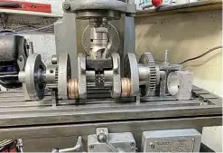  ??  ?? Set up on milling machine to align crank-pin five with crankpin two.