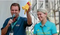  ?? GETTY IMAGES ?? Rio de Janiero mayor Eduardo Paes, left, gets a toy kangaroo from Australia’s chef de mission Kitty Chiller.