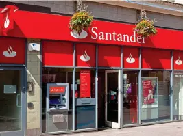  ??  ?? COST: Santander levies a ‘flat fee’ of £6 a day if your account is overdrawn