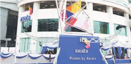  ?? — Bernama photo ?? Axiata and its portfolio of regional telcos is currently in consolidat­ion mode with plans to exit from Myanmar, Kenanga Research says.
