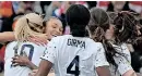  ?? AFP SAEED KHAN AFP ?? USA forward Sophia Smith (second from left) is congratula­ted by her teammates after scoring the opening goal against Vietnam. |