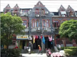  ?? GAO ERQIANG / CHINA DAILY ?? Neighborho­od in Hongkou district where European Jews lived during World War II.